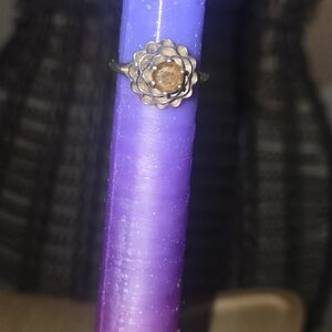 Floral Bronze Ring on Purple Candle